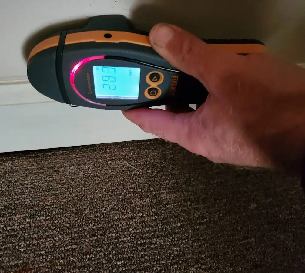 Moisture detection at baseboard during Burst Pipe Cleanup in North Smithfield